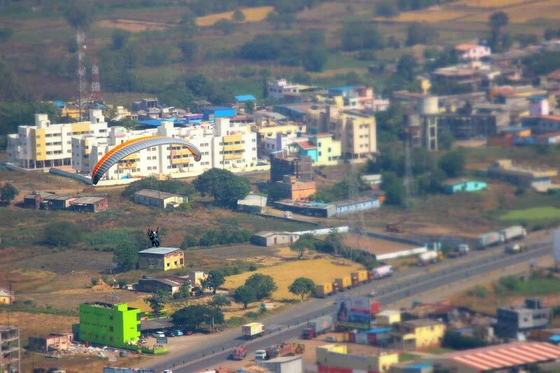 Kamshet_a large building with a train on top of it