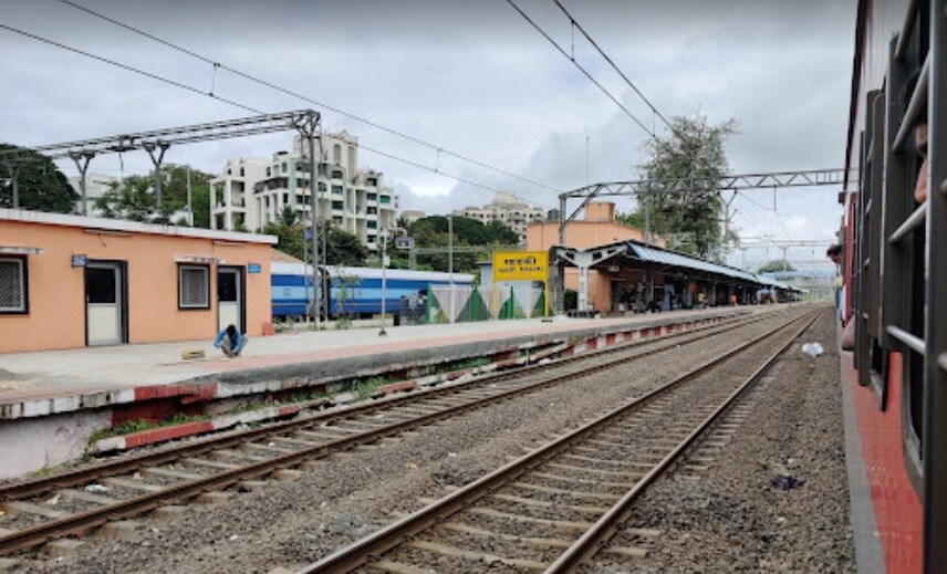 Khadki_a train station with a train on the tracks
