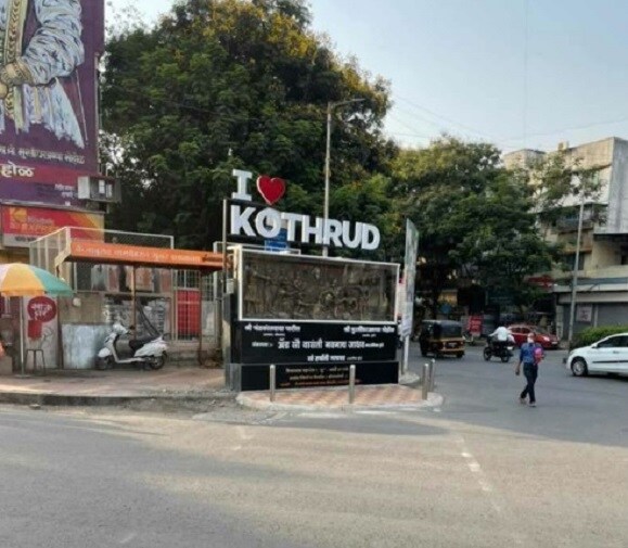 Kothrud_a street sign on the side of a road