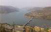 Lavasa_a large body of water with a bridge over it