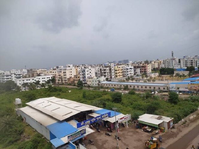 Manjari_a large truck is parked on the side of the road