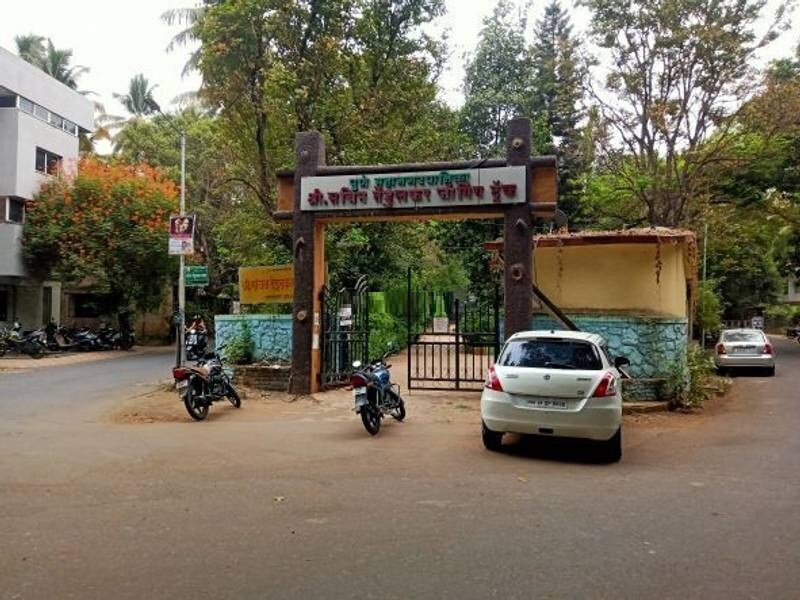 Rajendra Nagar_motorcycles parked in front of a gas station