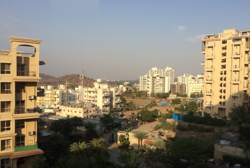 Uttam Nagar_a city with lots of buildings and trees