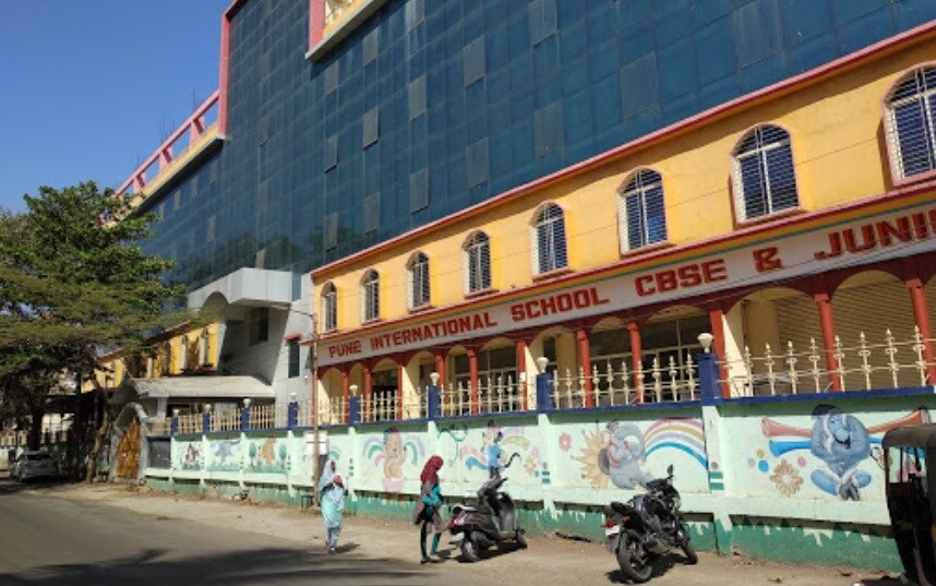 Vidyanagar_motorcycles parked in front of a building