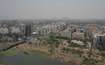 Viman Nagar_a city with lots of tall buildings and a river