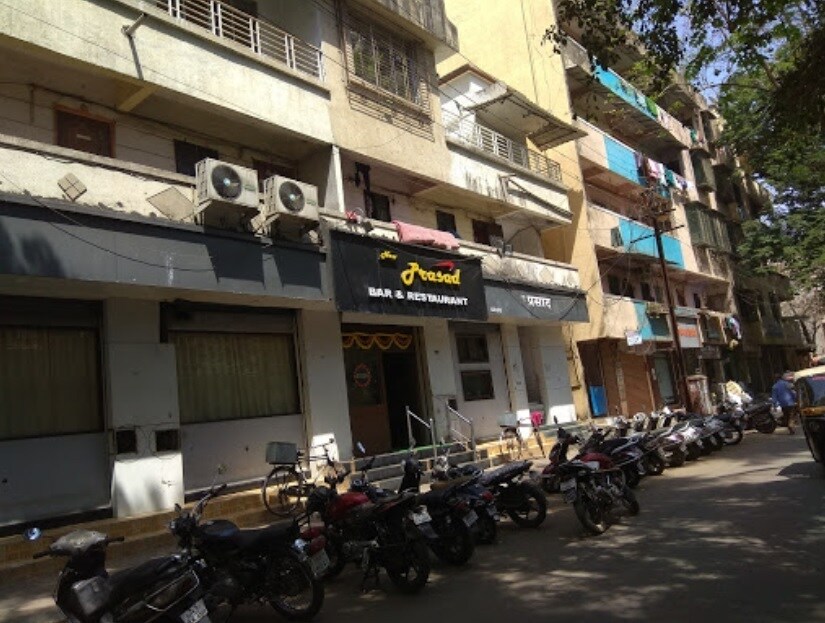 Ambika Nagar_motorcycles are parked in front of a building
