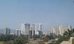 Azad Nagar_a city with tall buildings and a sky background