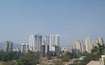 Azad Nagar_a city with tall buildings and a sky background