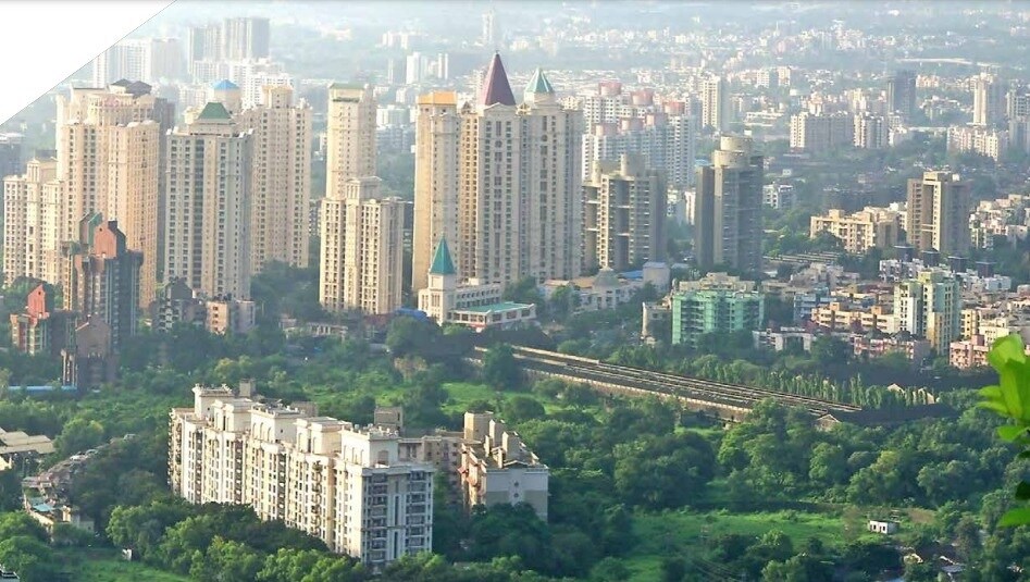 Ghodbunder Road_a city with tall buildings and tall buildings