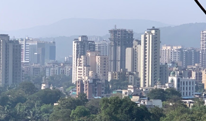 Koliwada_a city with tall buildings and tall buildings