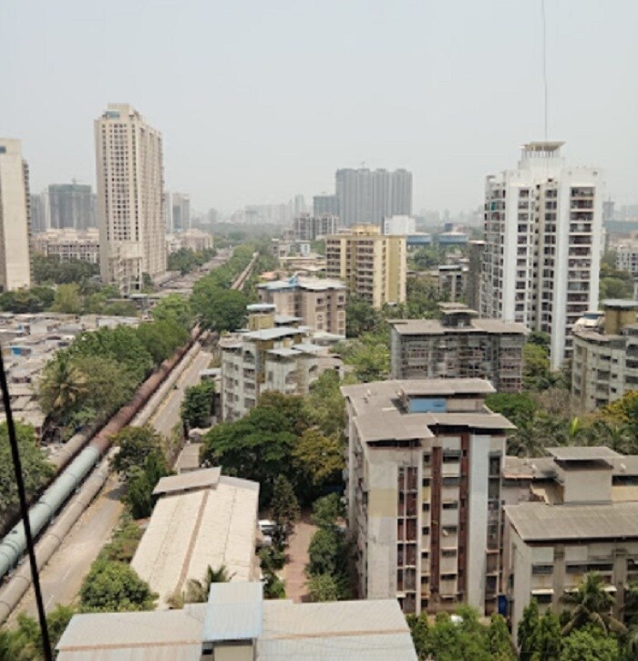 Sambhaji Nagar_a city street with tall buildings and buildings