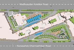 Adani-Ten-BKC_an aerial view of a city with a train on the tracks