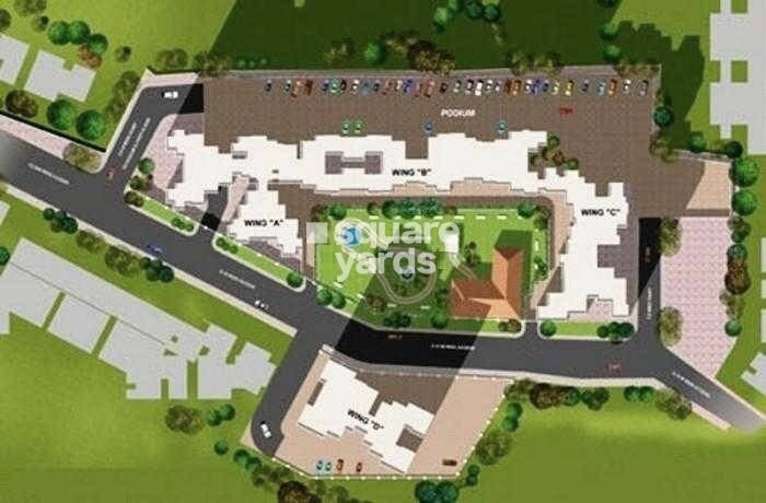 Adinath-Neelkanth-Enclave_an aerial view of a field with a large building