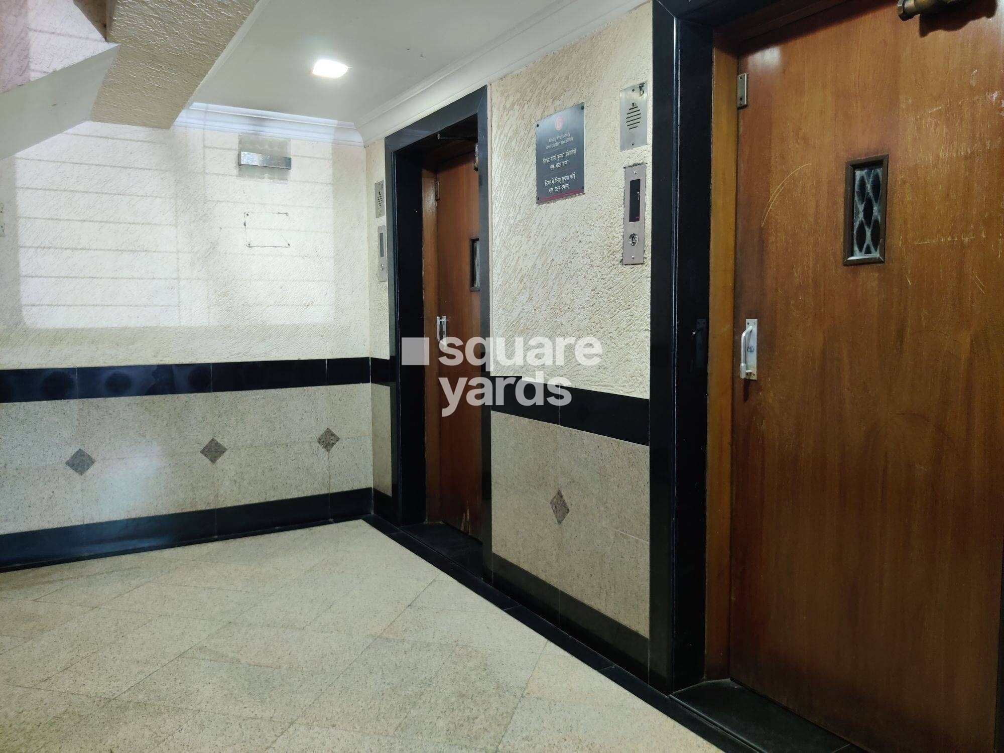 K Raheja Palm Court J Building Lift Lobby Image