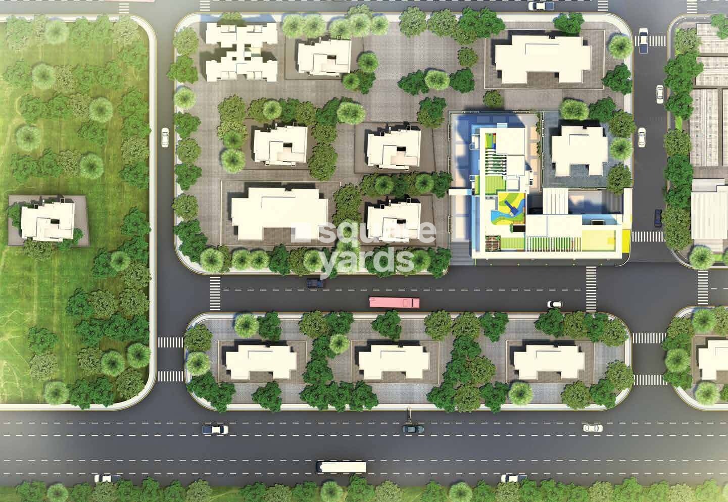 Matrubhoomi-Panchratna-NX_an aerial view of a street with a lot of green grass
