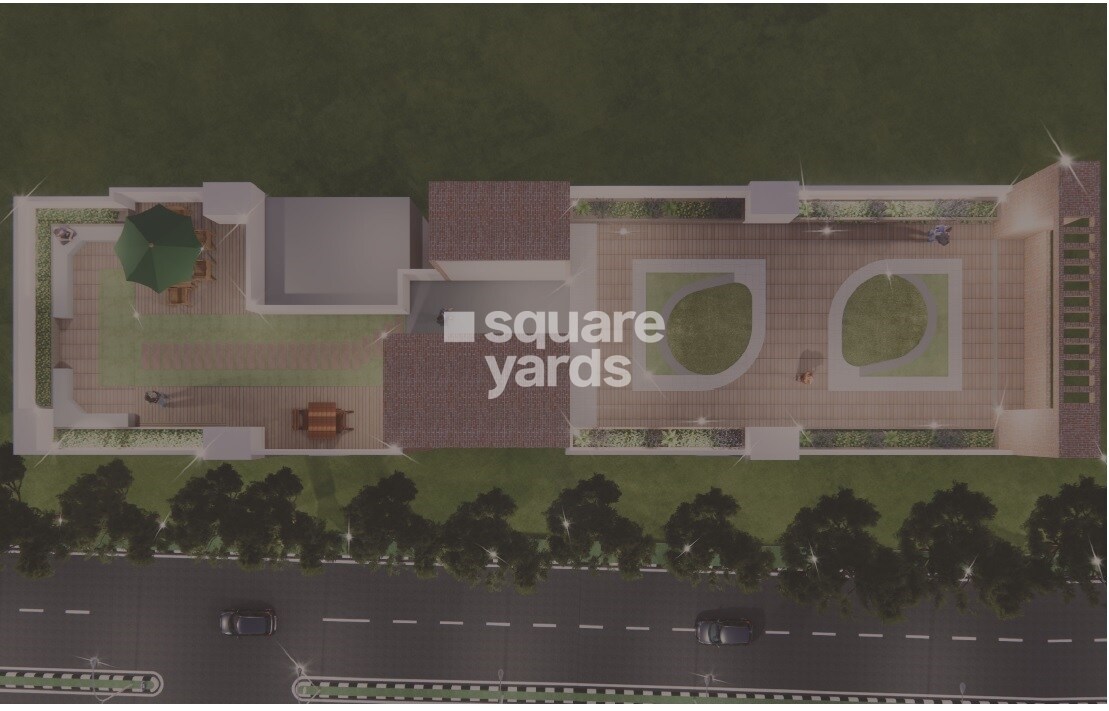 Rajeshree-Ambal-Parijath-CHS_an aerial view of a large group of people in a field