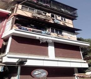 Asha Building Apartment