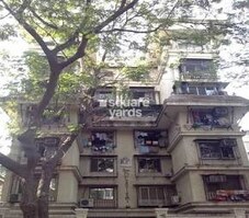 Dhanlaxmi CHS Asalpha Featured Image