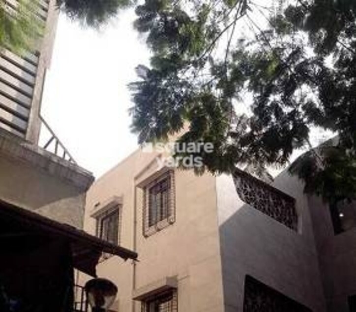 Pooja Building Cover Image