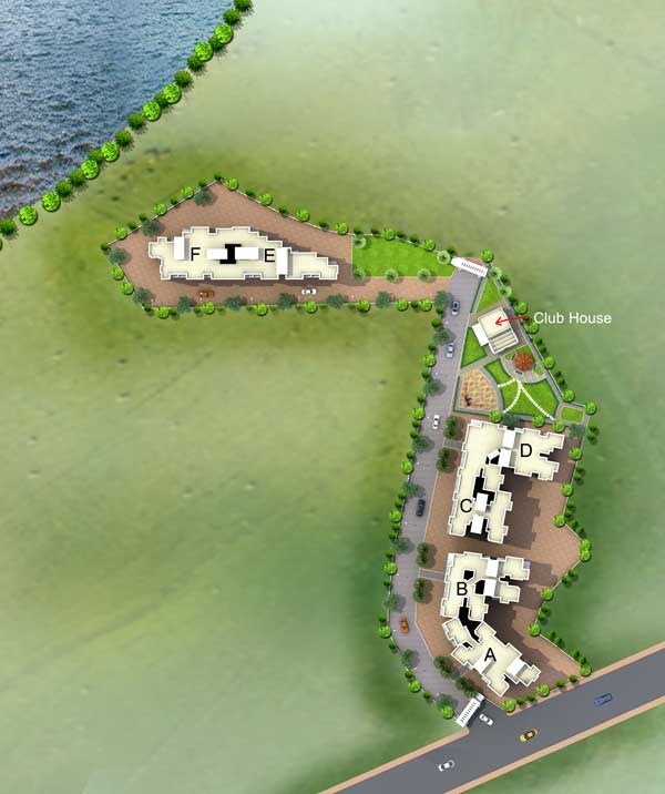 Ashapura-My-Sky-Residency_an aerial view of a green field with a large body of water