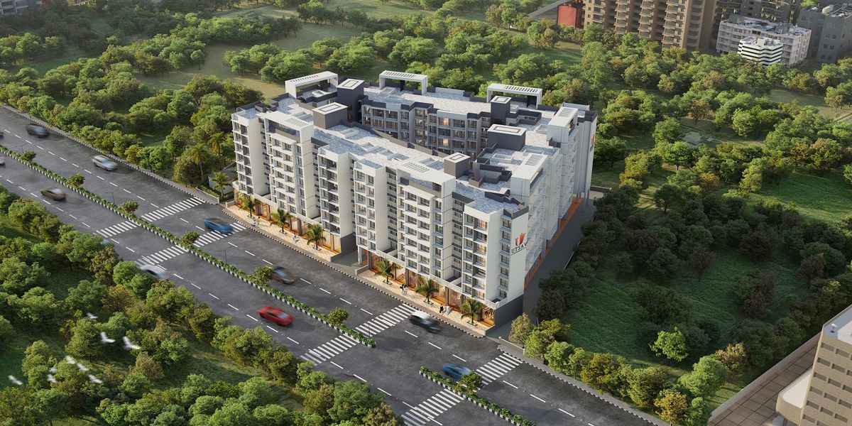 Nirvana-Utsav-Residency_a large building with a lot of trees