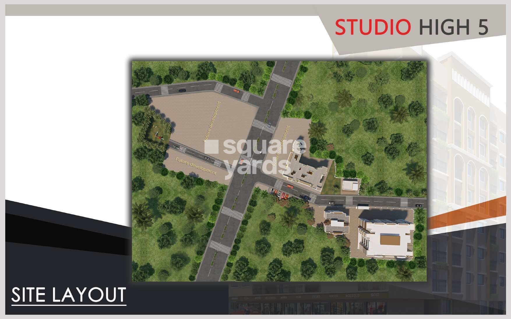 Sonu-Studio-High-5_an aerial view of a city with a large building