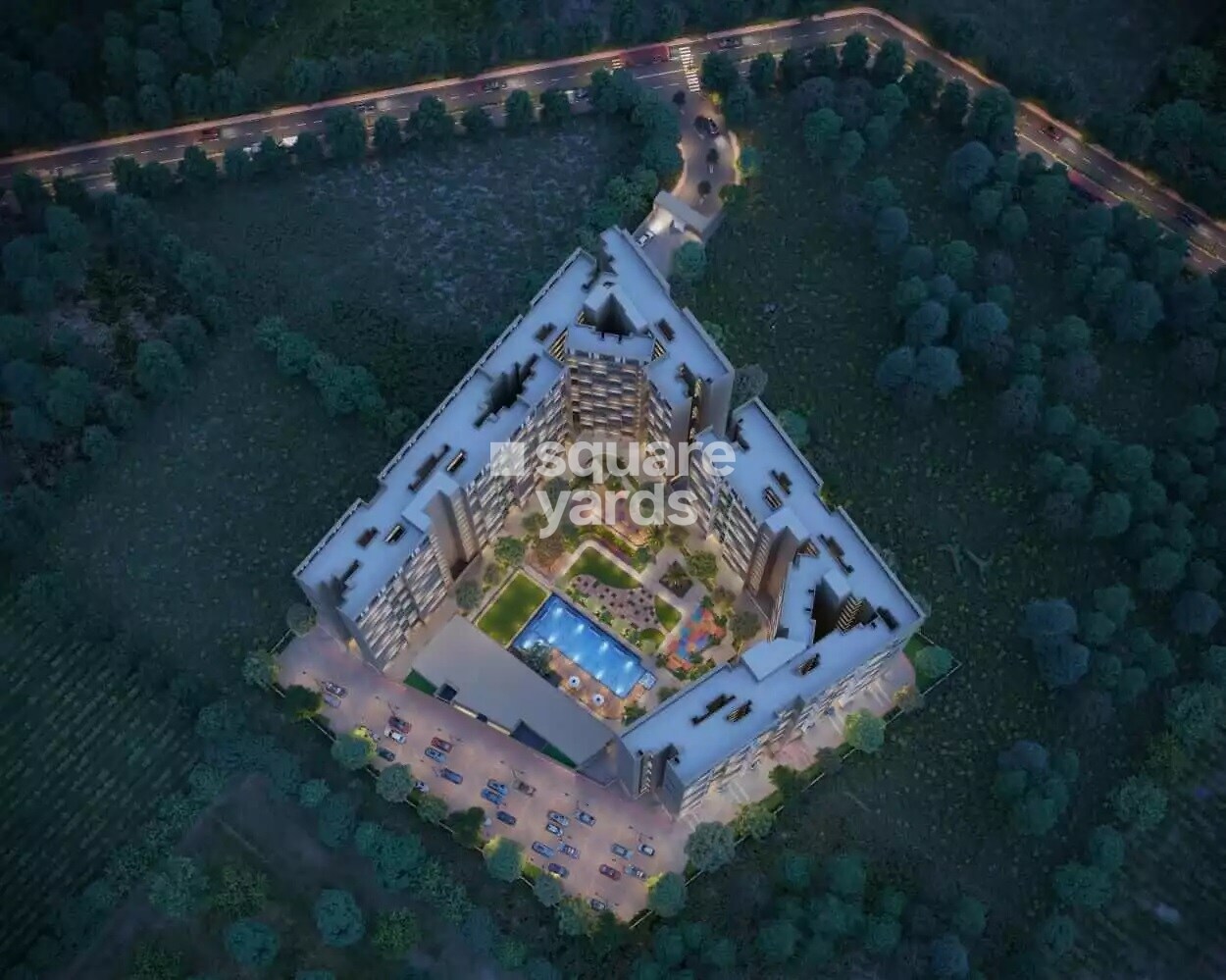 Today-Royal-Aikyam_an aerial view of a building with a train on it
