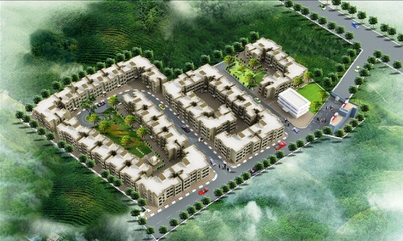 Vardhaman-Residency-Pashane_an aerial view of a city with a large building