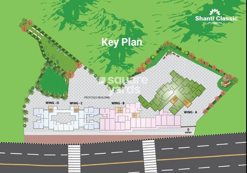 Rachna-And-Crystal-Shanti-Classic_an aerial view of a street with a train on it
