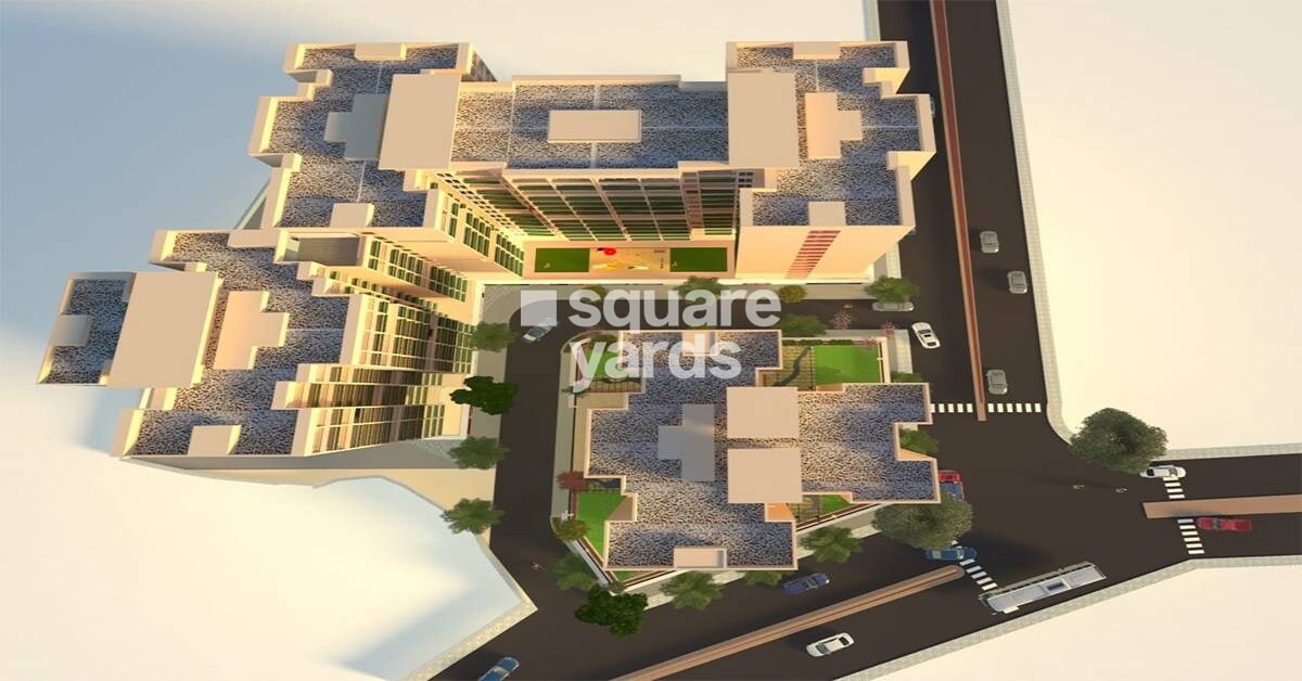 Sanskruti-Sapphire_an aerial view of a building with a clock on it