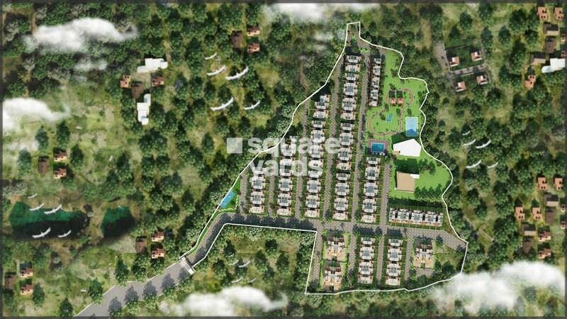 Spanish-Residency_an aerial view of a grassy area with a train on the tracks