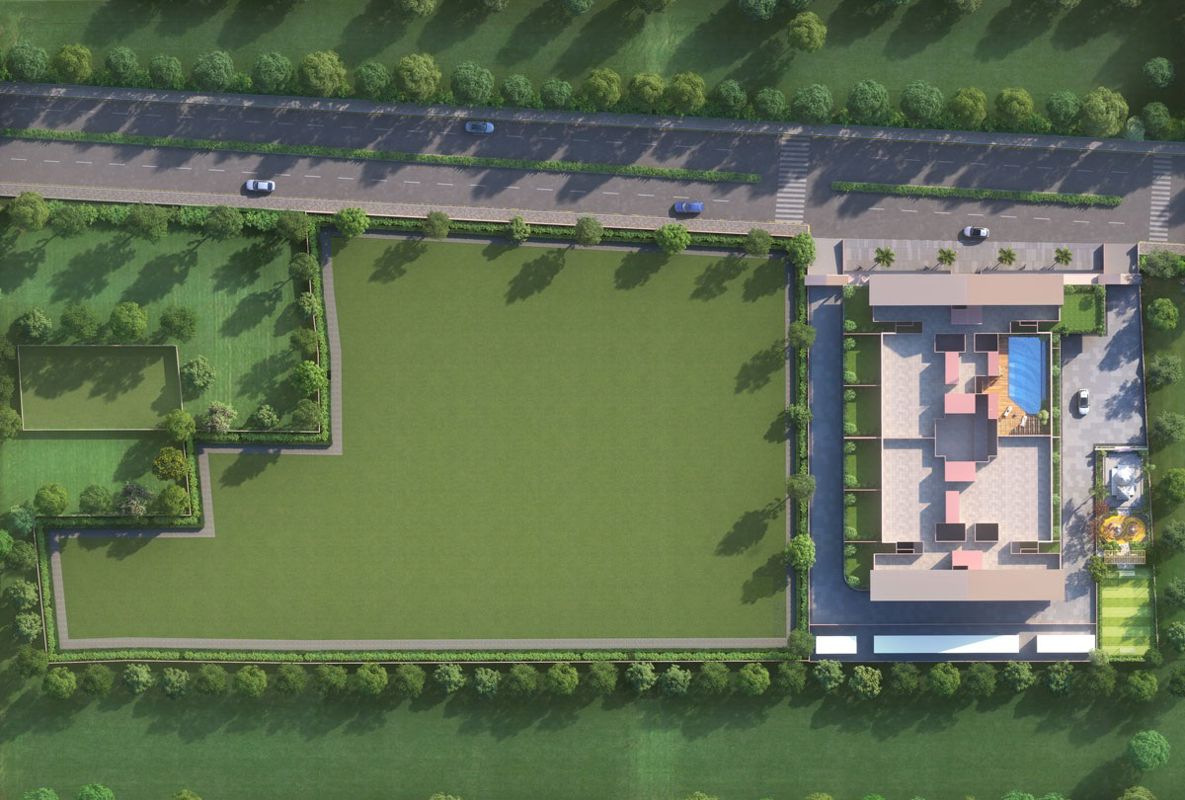 Ashtekar-Prabhangan_an aerial view of a green field with a train on it