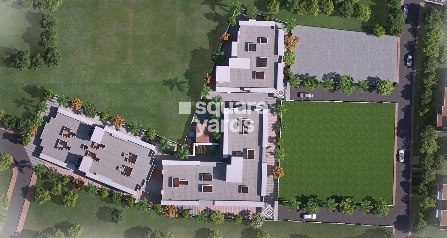 Chandrangan-Revanta_a large building with a lot of trees