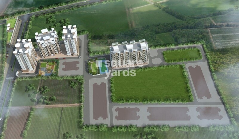 an aerial view of a large building with a train on it