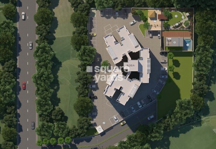 Gagan-Tisha_an aerial view of a field with a large building