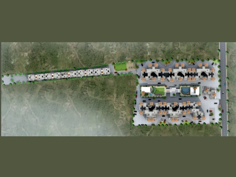GK-Royale-Rahadki-Greens_an aerial view of a street with a building