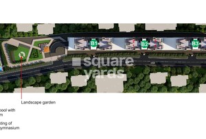 Kumar-Paradise-Pune_an aerial view of a train on a train track