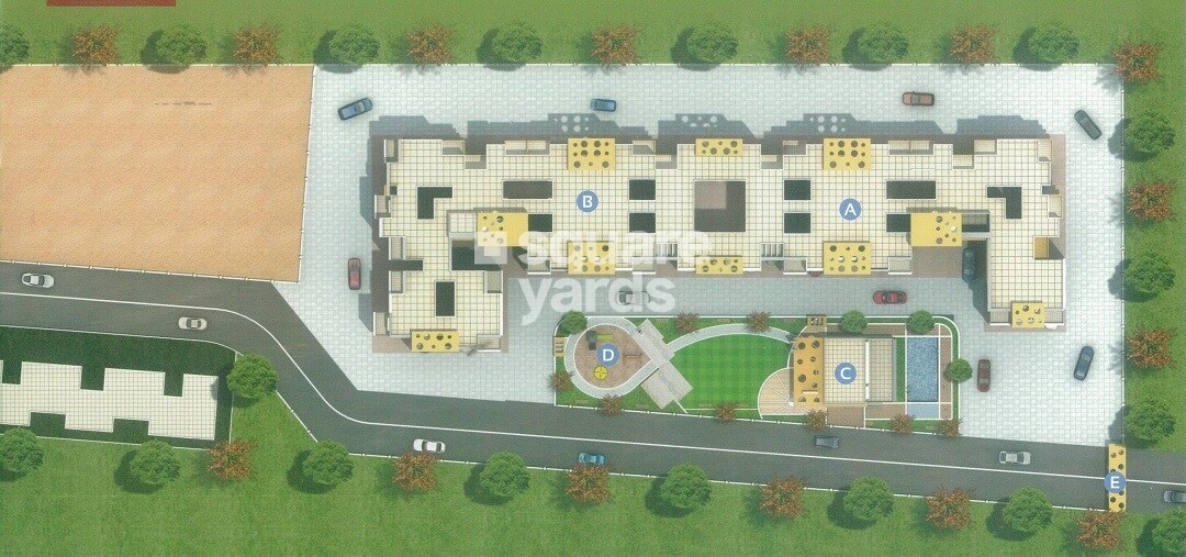 Mehta-Shree-Jalaram-Park_an aerial view of a field with a large building