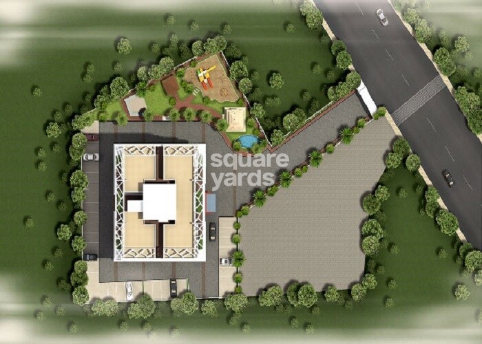 Nirmaann-Shankeshwar-Darshan_an aerial view of a building with a train on top of it