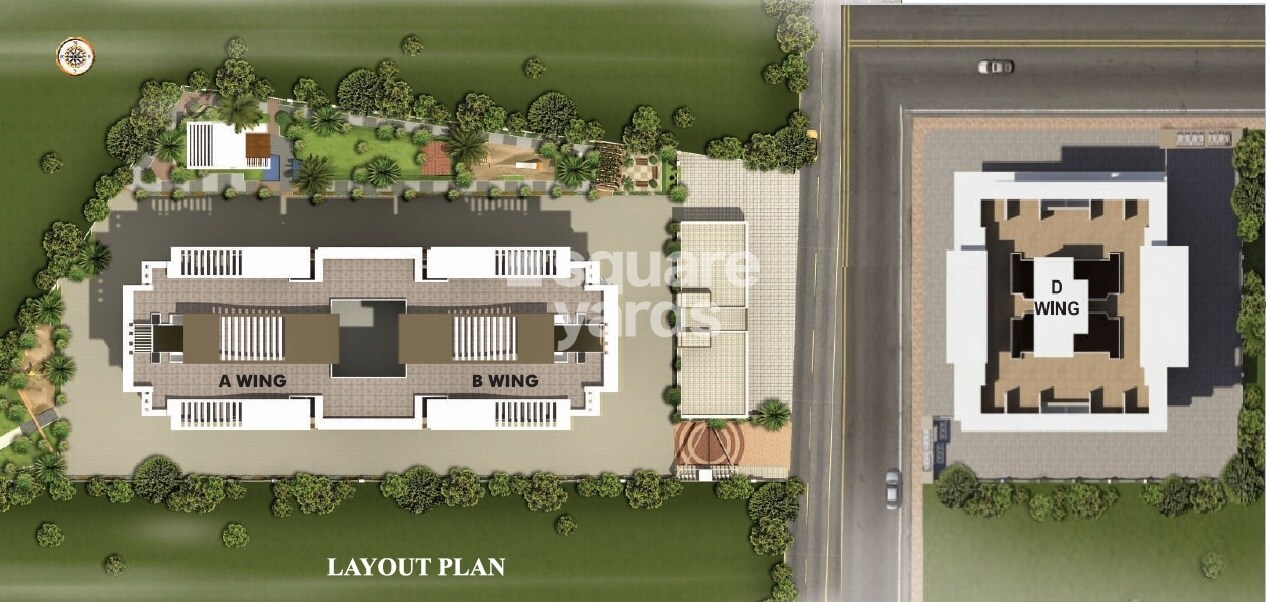Nirman-Silver-Mist_an aerial view of a building with a train on it