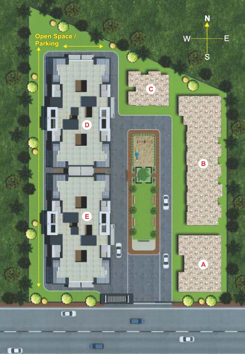 Polite-Shree-Ganesh-Tower_an aerial view of a grassy area with a train on the track