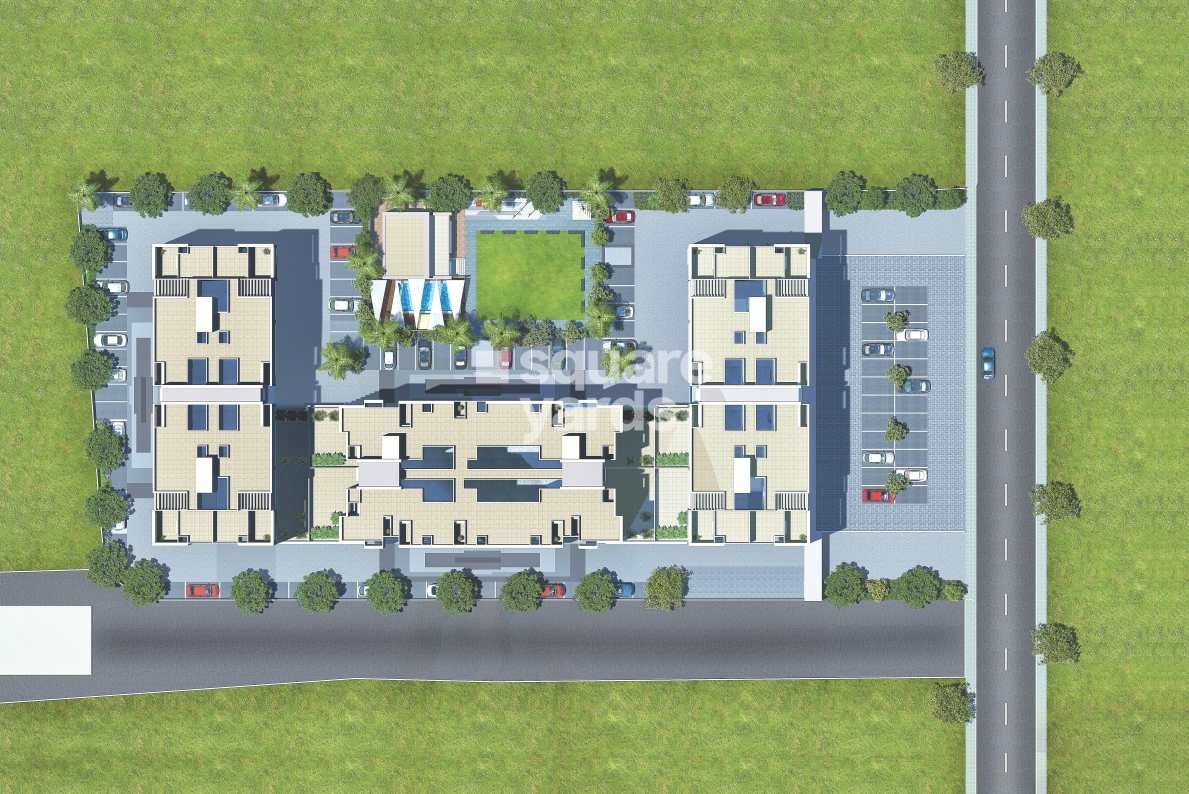 Rajesh-Golden-Homes_an aerial view of a field with a train on it