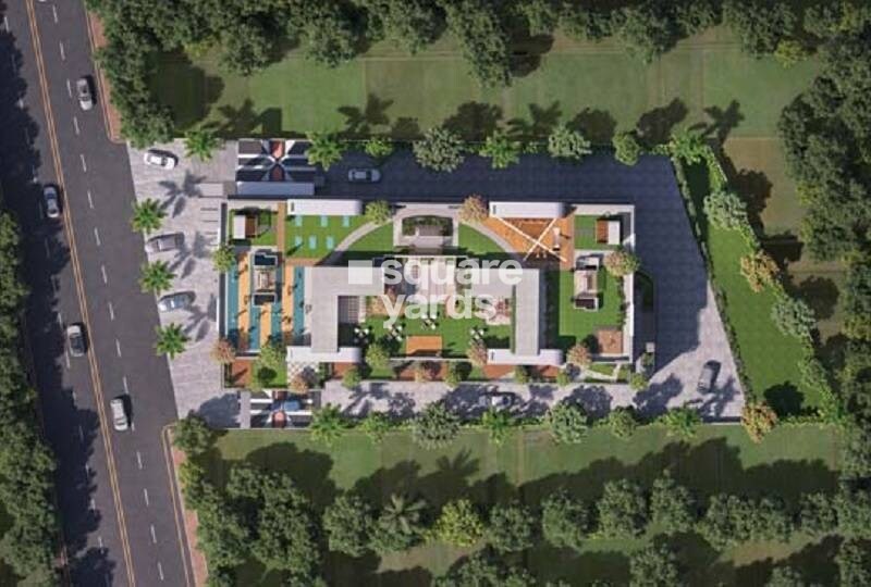 Ram-India-Address-One_a large building with a lot of trees