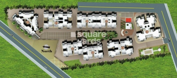 Renuka-Gulmohar-C-Building-CHS_trucks are parked on the side of the road