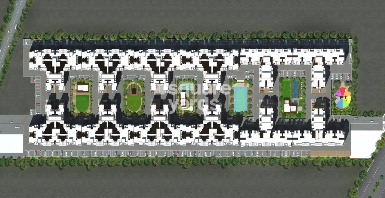 Sai-Essen-Aishwaryam-Hamara-Abhimaan_an aerial view of a building with graffiti on it