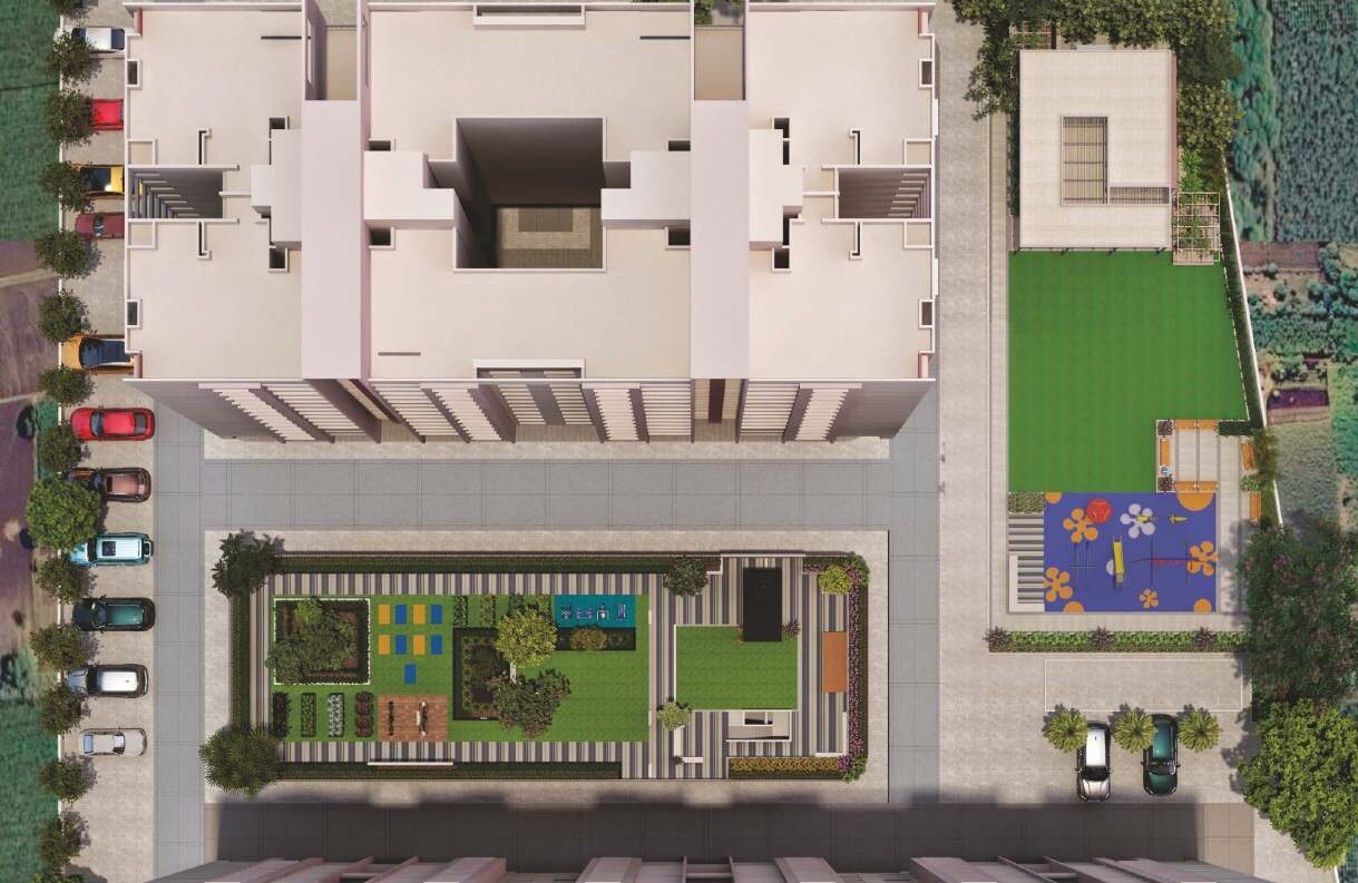Shlok-CHS-Moshi_a cityscape of a building with a train on the tracks