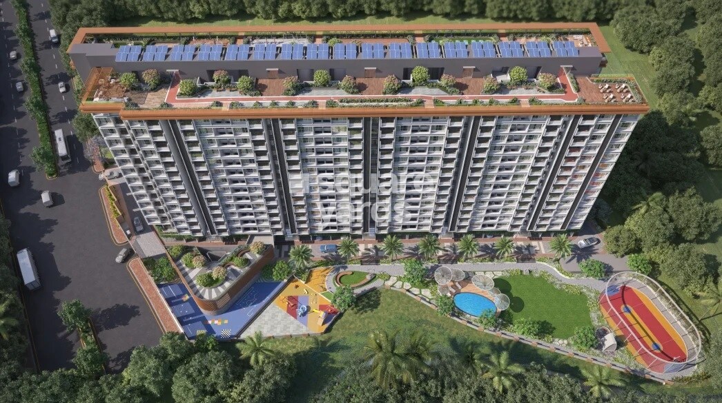Shree-Sonigara-Vivanta-Next_a large building with a lot of trees on top of it