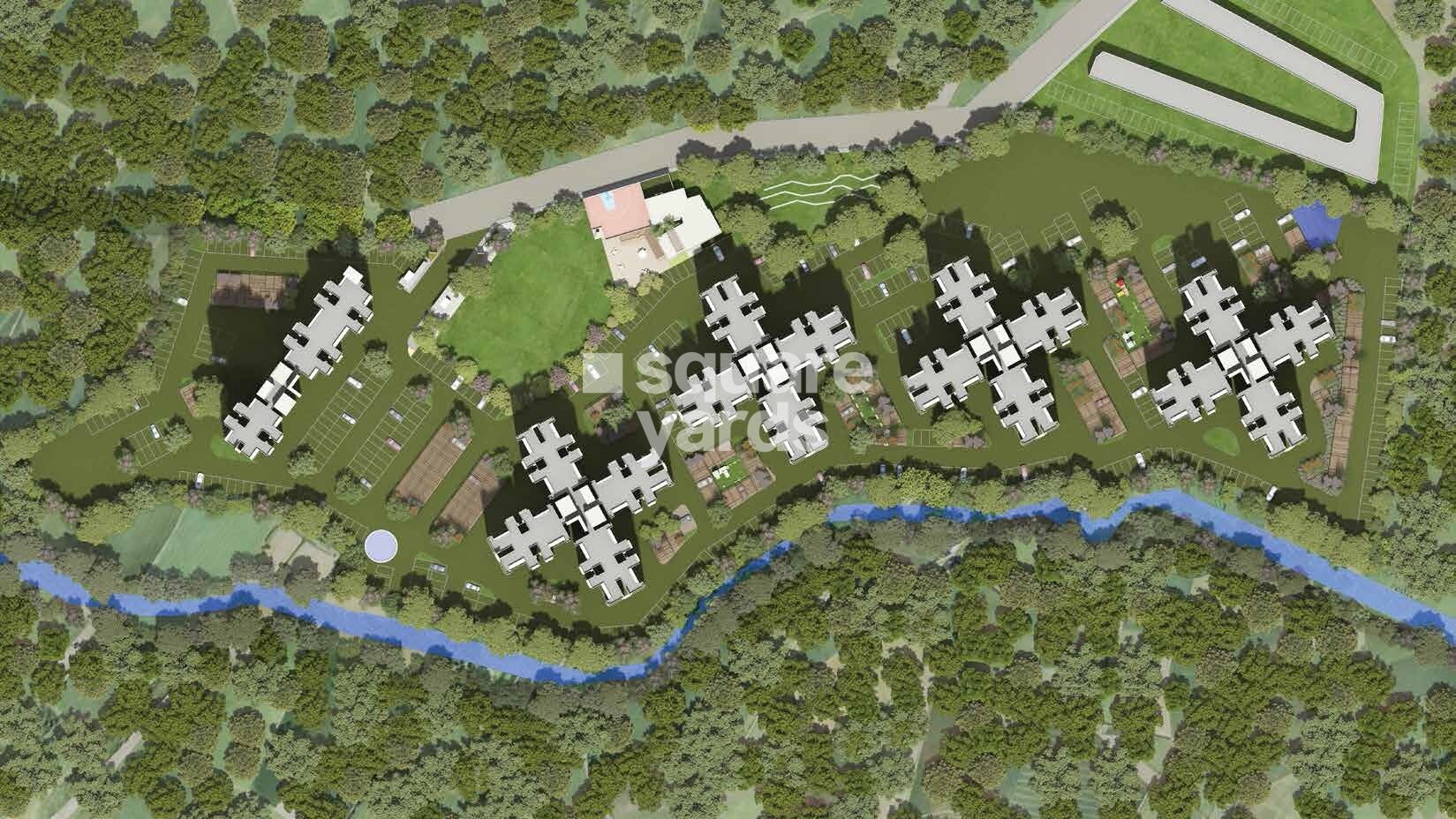 Skyi-Star-Town-Phase-1_an aerial view of a grassy field with a train on it