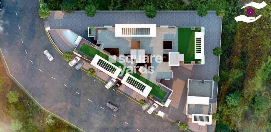 Sneha-Sparsha-Residency_a large building with a lot of trees