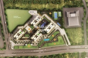 VJ-Town-Centre_an aerial view of a field with a train on it